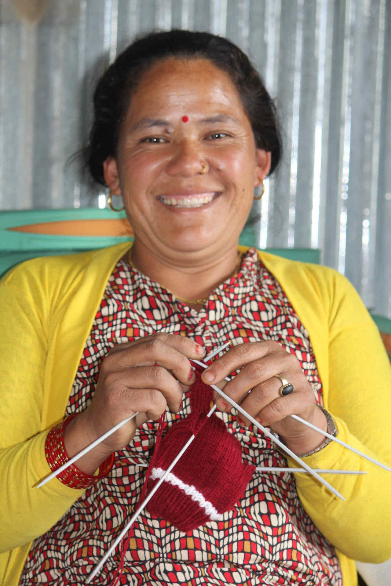 A Talakhu Women's Network member demonstrating her knitting during livelihood training