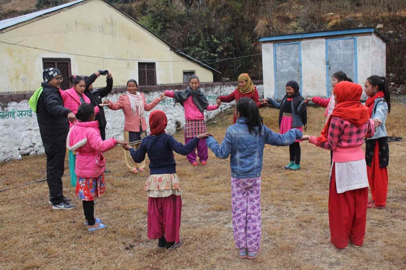 Adolescent girls taking part in a Dignity Project group mobilization session