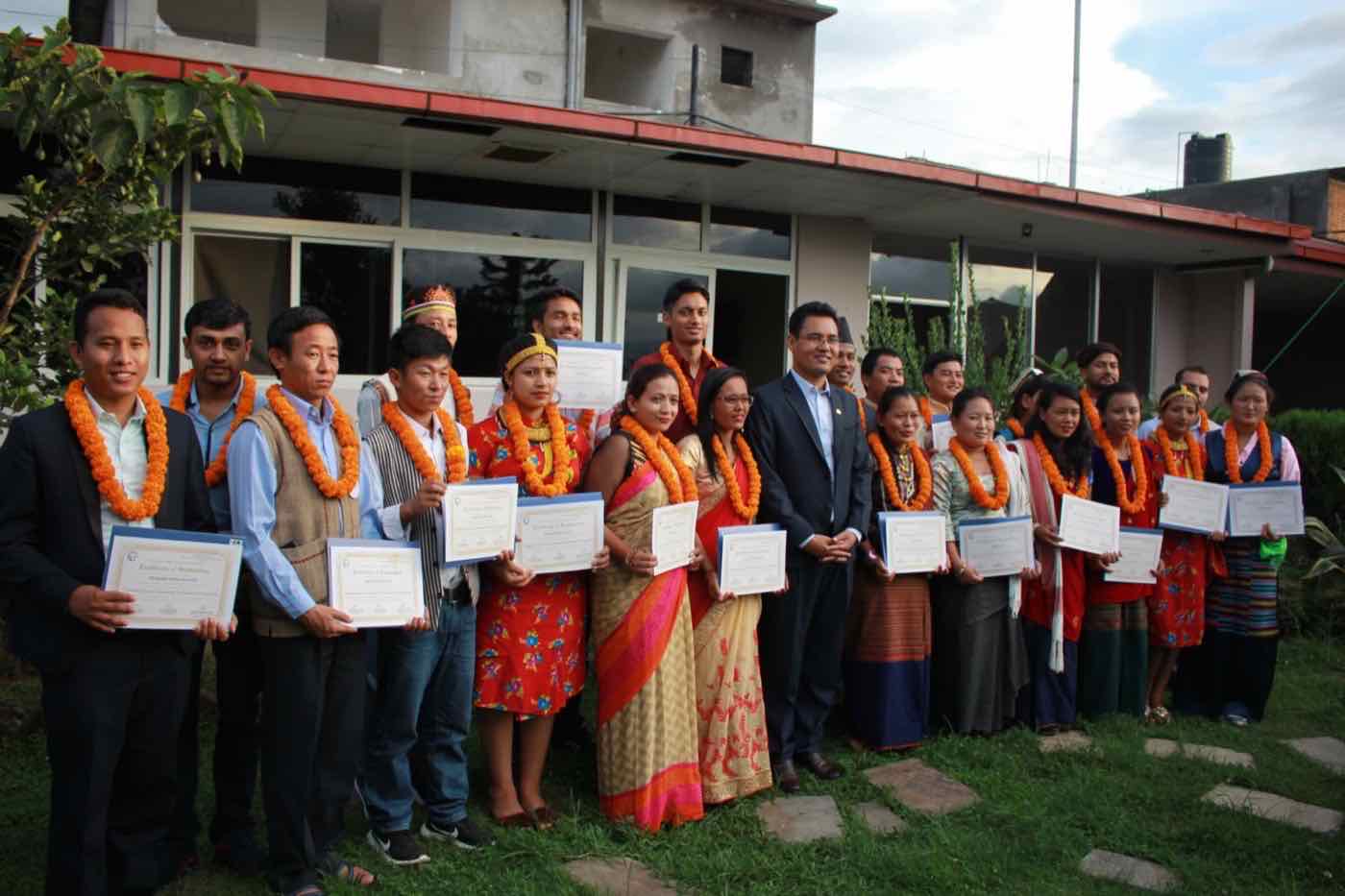 Community Development Management graduates holding certificates in Bandegaun, Lalitpur