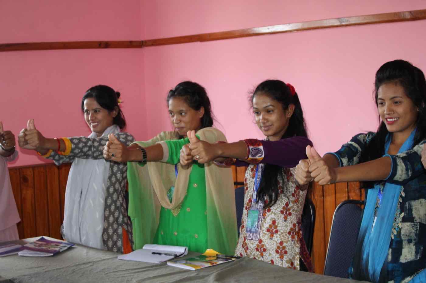 Women taking part in an interactive TPTC training exercise