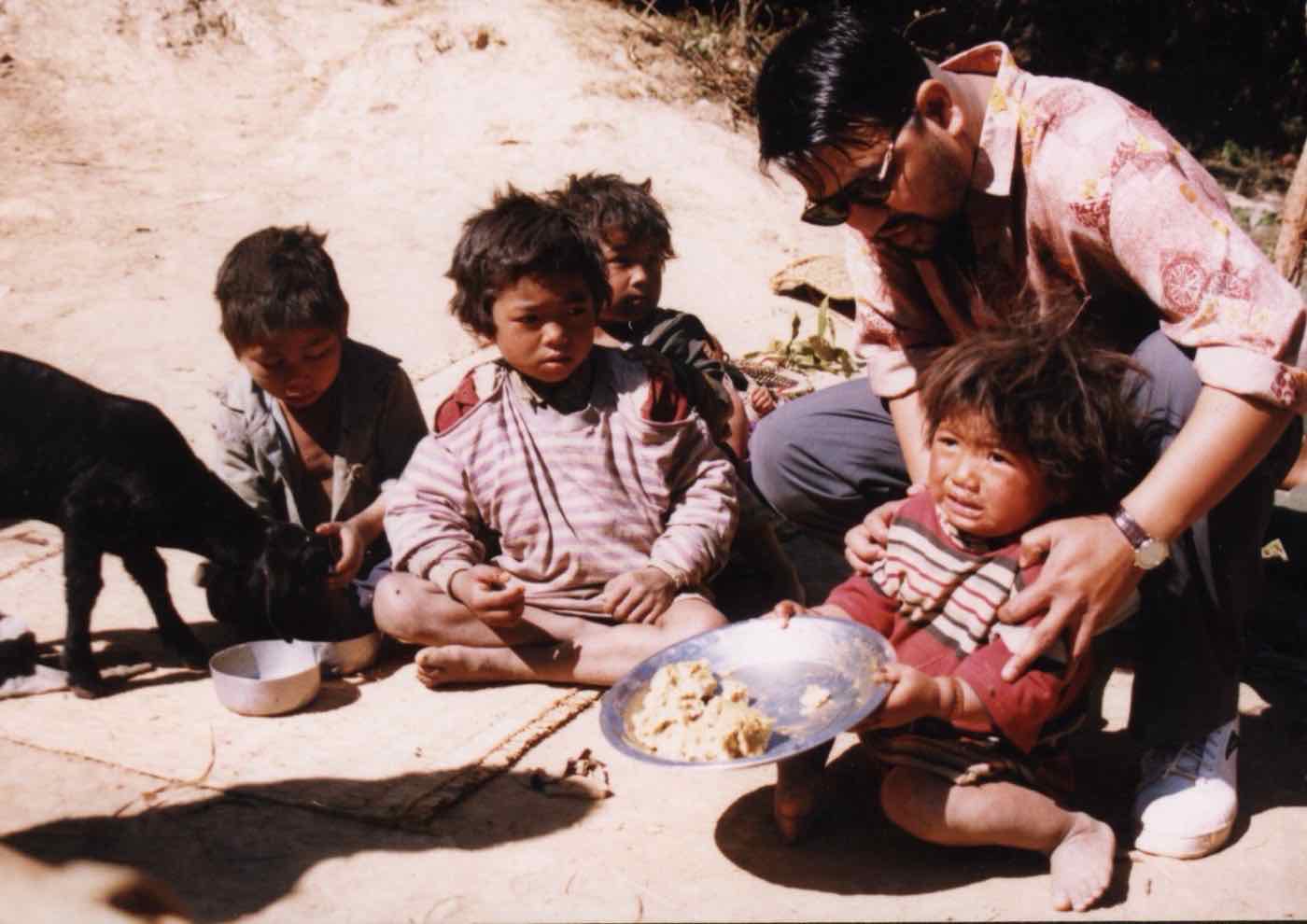 Ramesh with children from the community during a CBHDP outreach visit
